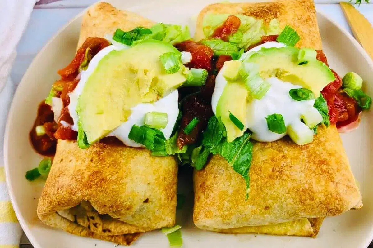Chimichangas on a plate.