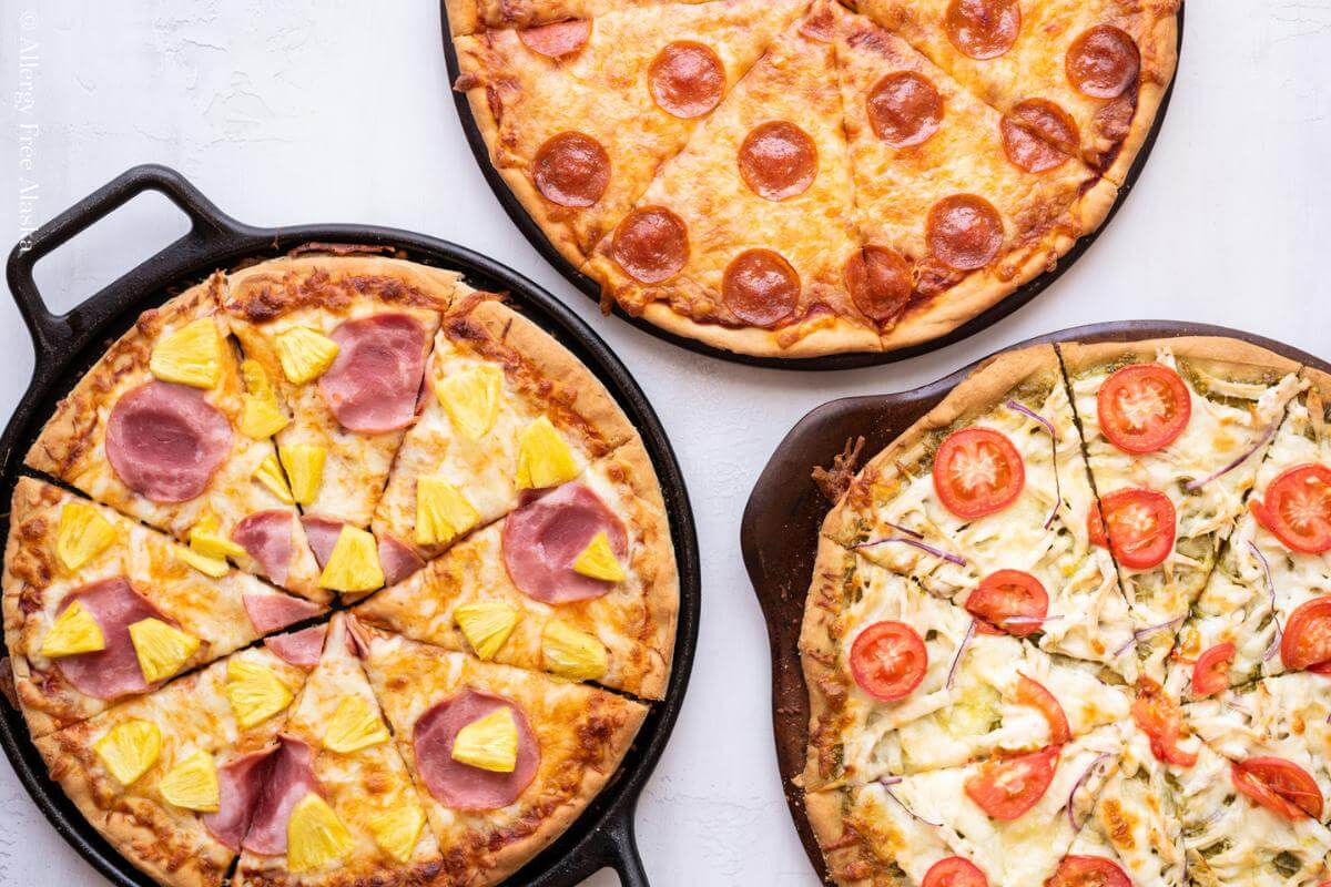 Three different types of pizzas.