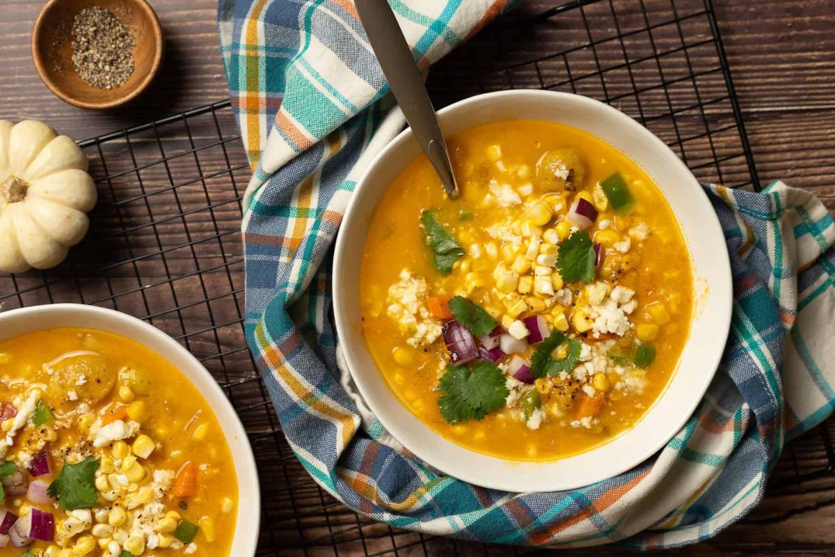 Pumpkin poblano corn chowder in a bowl.