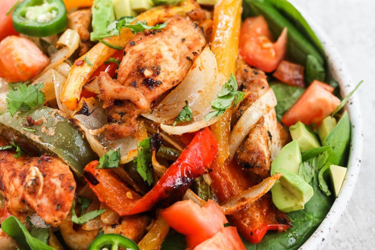 Chicken fajitas in a bowl.