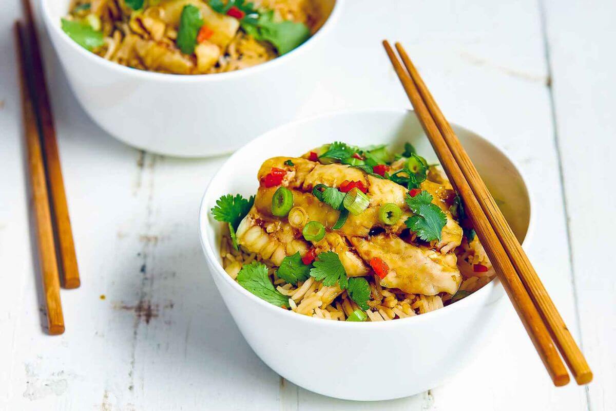 Bowls of soy and ginger fish.