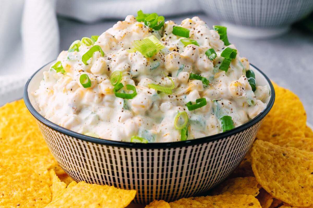 Creamy corn dip in a bowl.