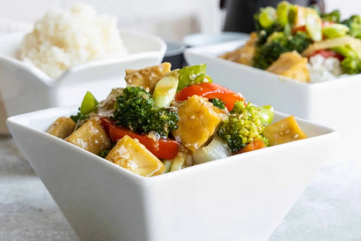 Crispy Sesame Garlic Tofu with Vegetables served in a bowl.