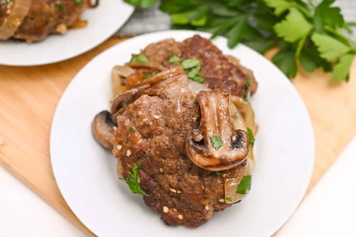 Salisbury steak on a plate.
