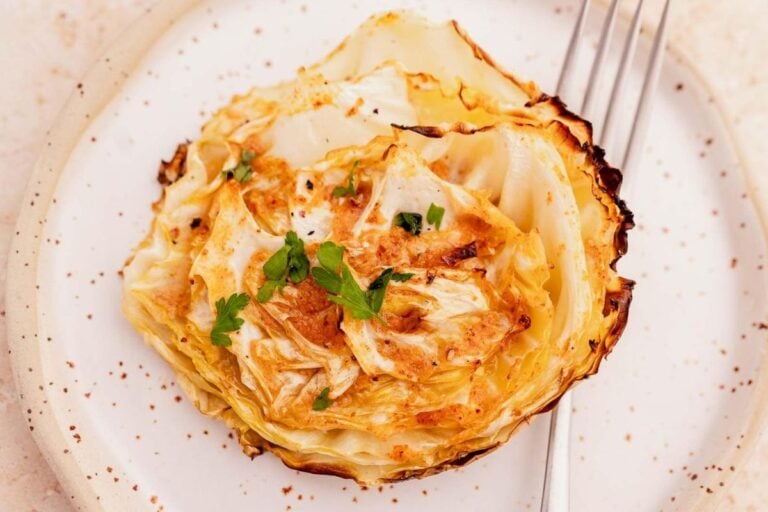 Roasted Cabbage Steaks served on a plate.