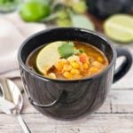 A mug full of Mexican veggie soup.