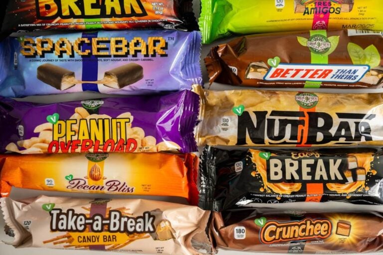 Stacked candy bars in wrappers.