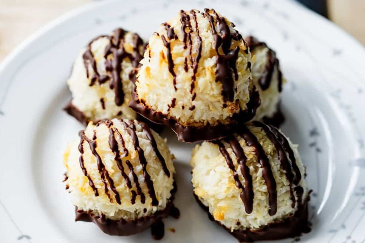 Chocolate-Dipped Coconut Macaroons drizzled with chocolate on top.