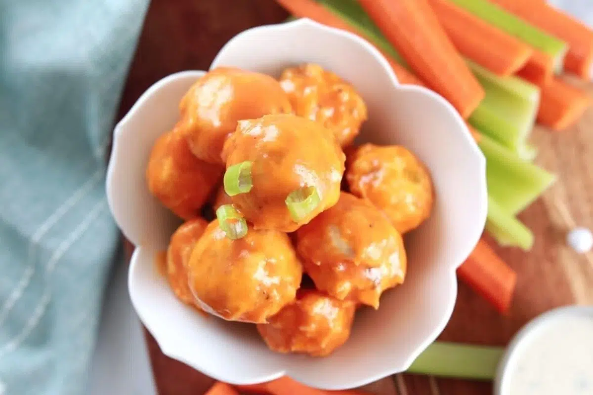 Keto Buffalo Chicken Meatballs with carrots and celery.