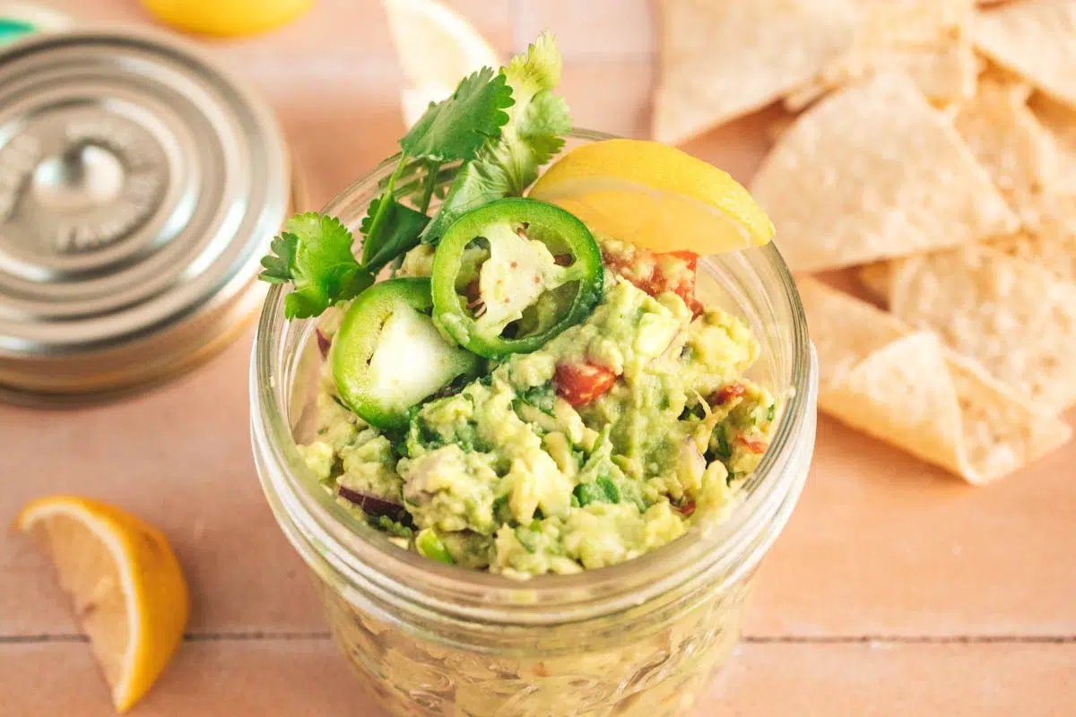 Lemon Guacamole Recipe Without Tomatoes in a jar.