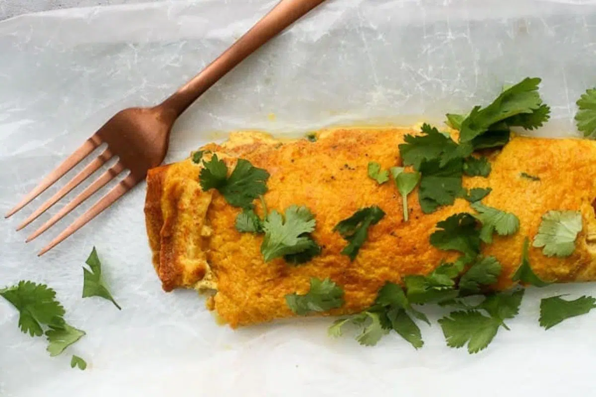 Masala Omelette topped with parsley.