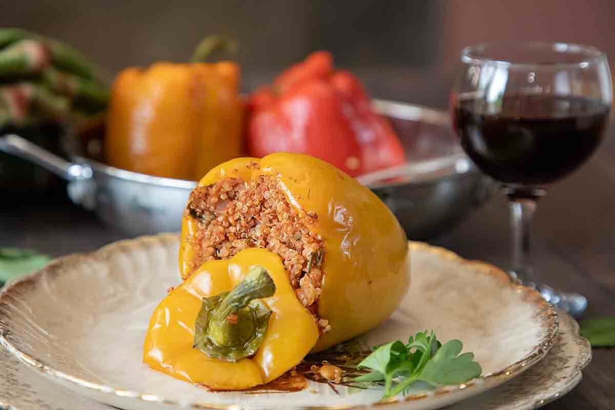 Quinoa Stuffed Peppers served with wine.