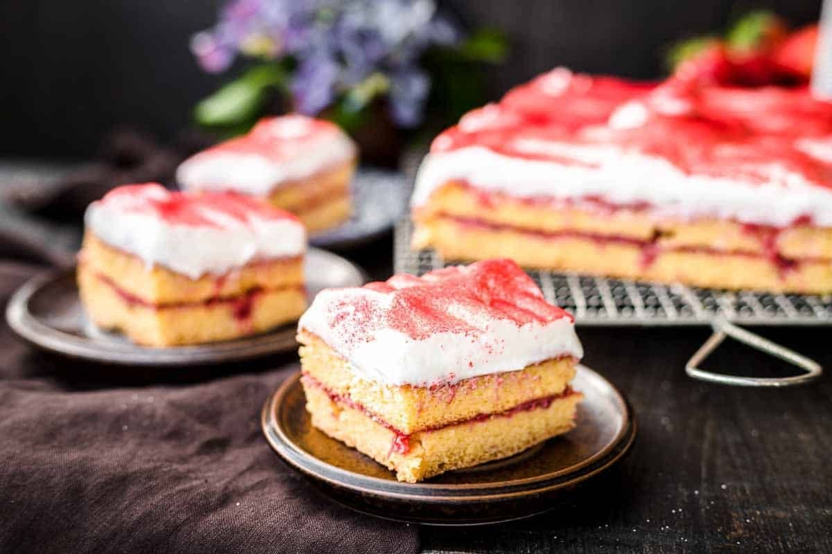 A slice of Strawberry Sheet Cake.