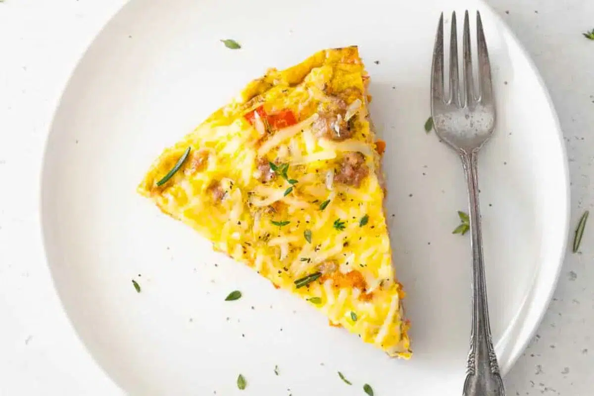 A slice of Sweet Potato and Sausage Frittata served on a plate.