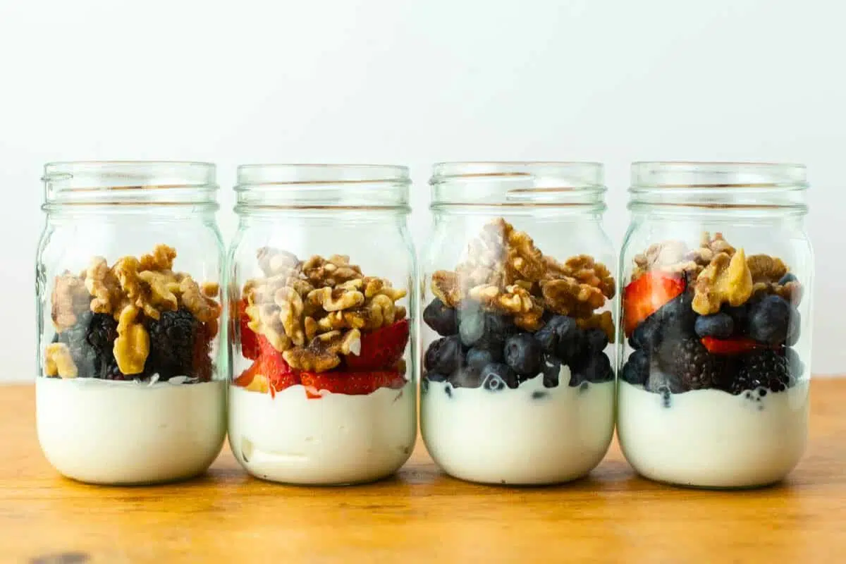 Berry Yogurt Parfait in jars.