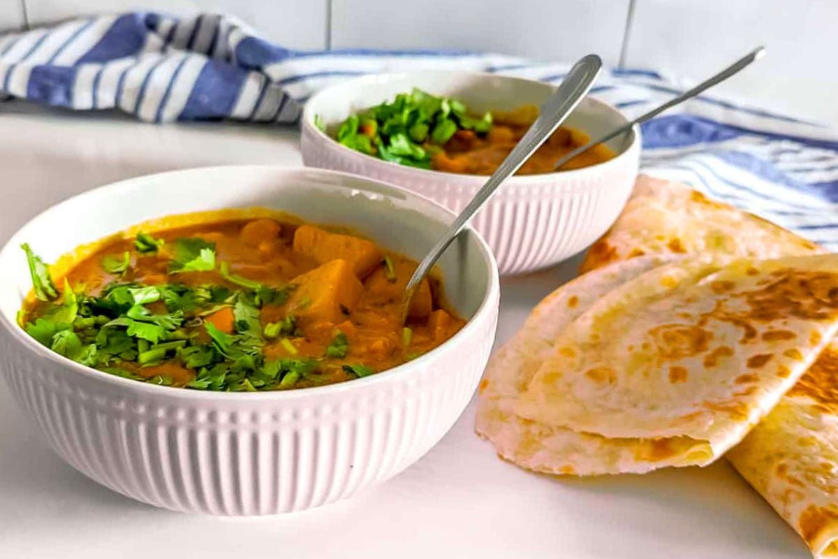 Butterbean and Potato Curry served in bowls.
