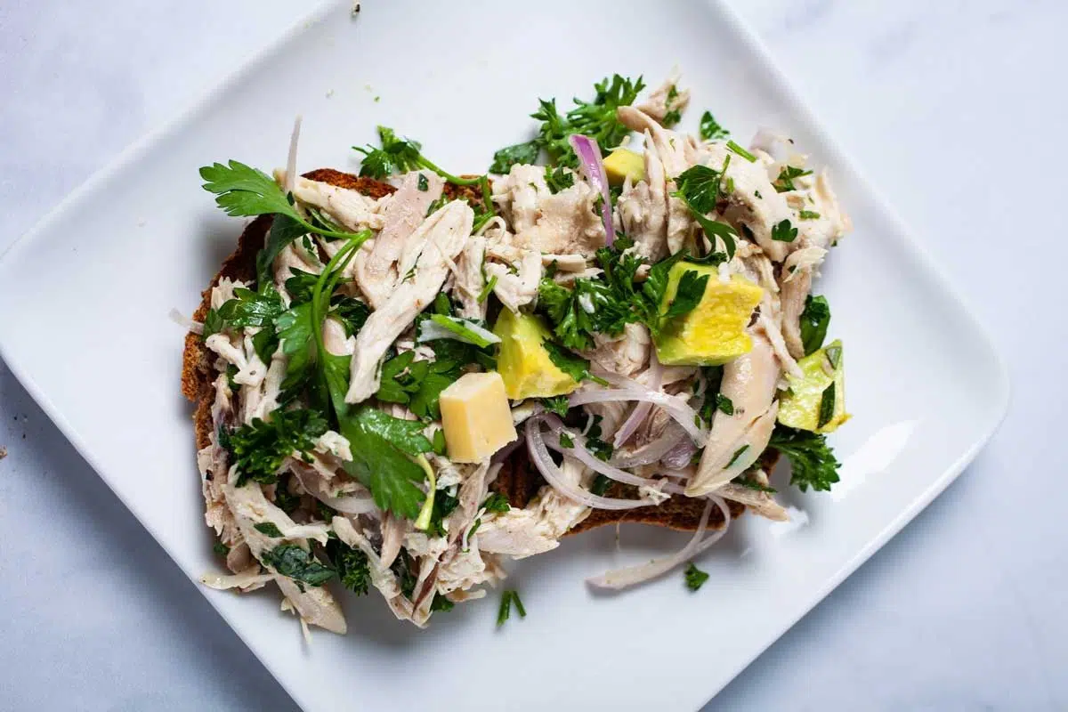 Chicken Salad topped with cilantro.
