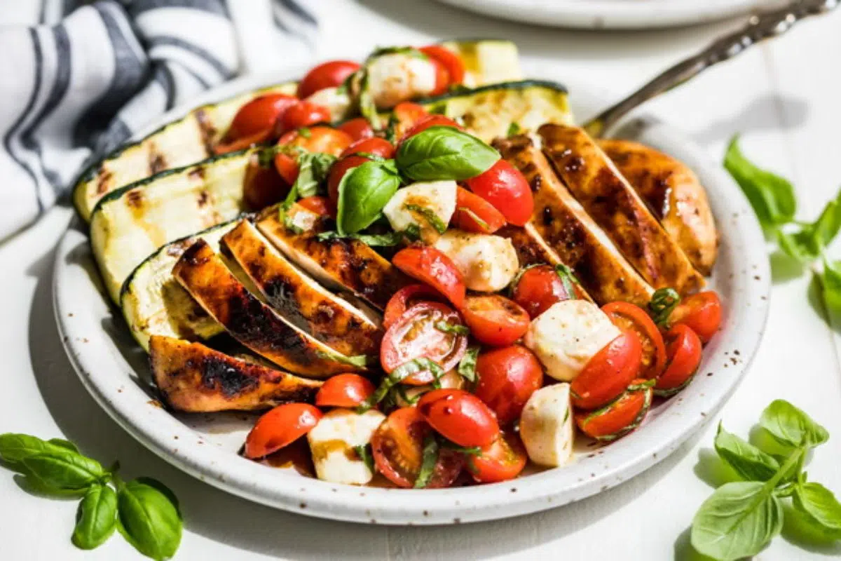 Grilled Chicken Caprese with tomatoes.