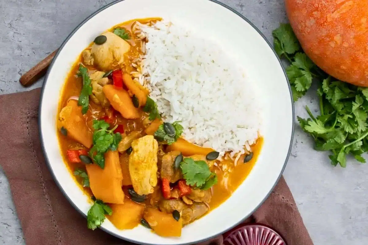 Red Kuri Squash and Chicken Curry topped with cilantro.