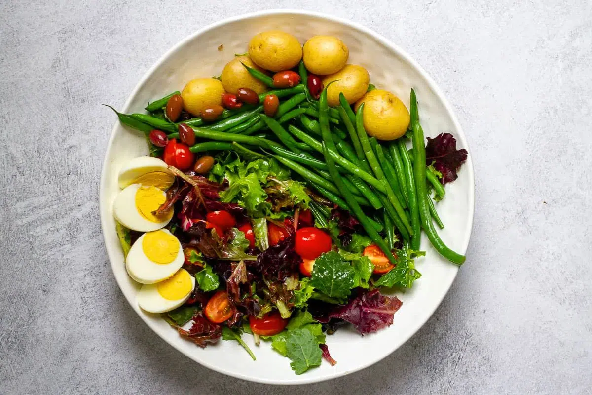 A plate full of Seared Tuna Niçoise Salad.