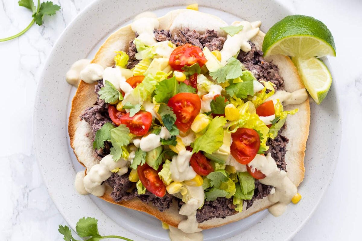 Vegan Black Bean Tostadas served on a plate.