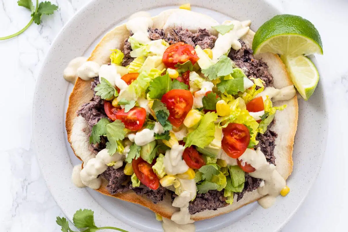 Vegan Black Bean Tostadas served on a plate.