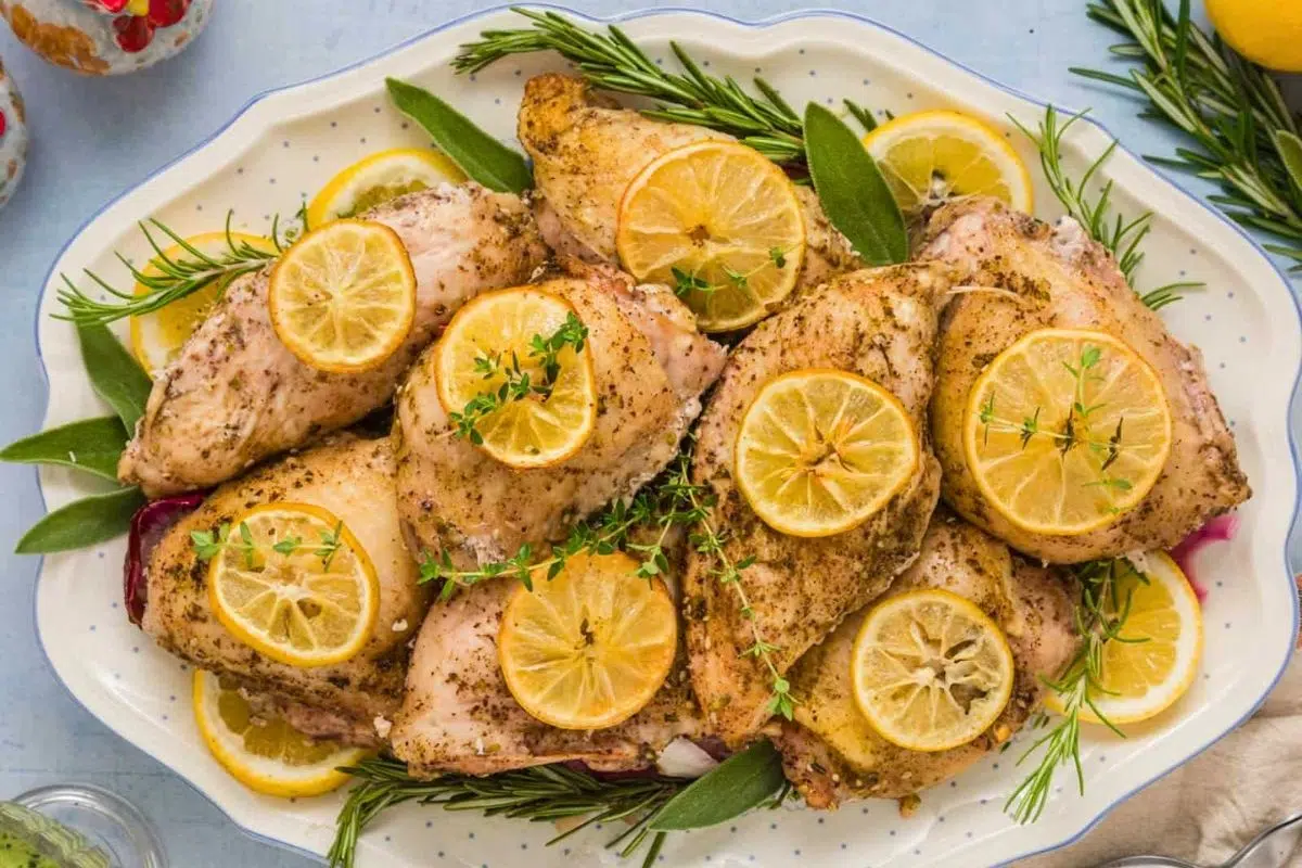 Za'atar Roasted Chicken with Lemon and Herbs served on a plate.