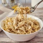 A bowl of slow cooker shredded chicken.