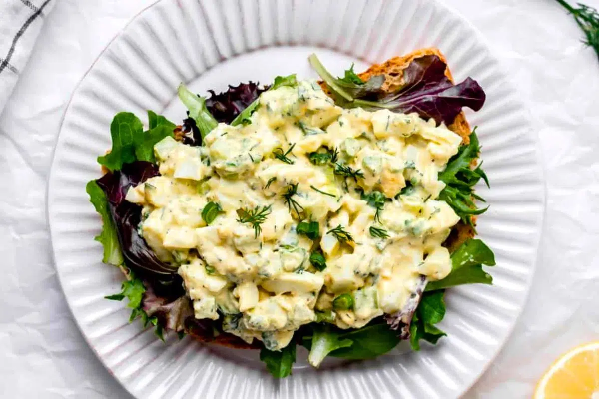 Cottage Cheese Egg Salad garnished with rosemary leaves.