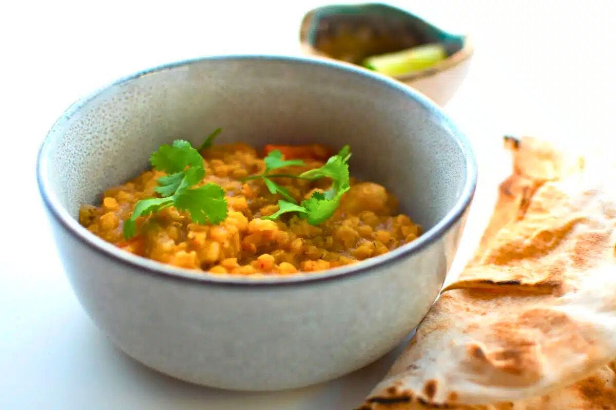 Creamy Coconut Red Lentil Curry served in a bowl.