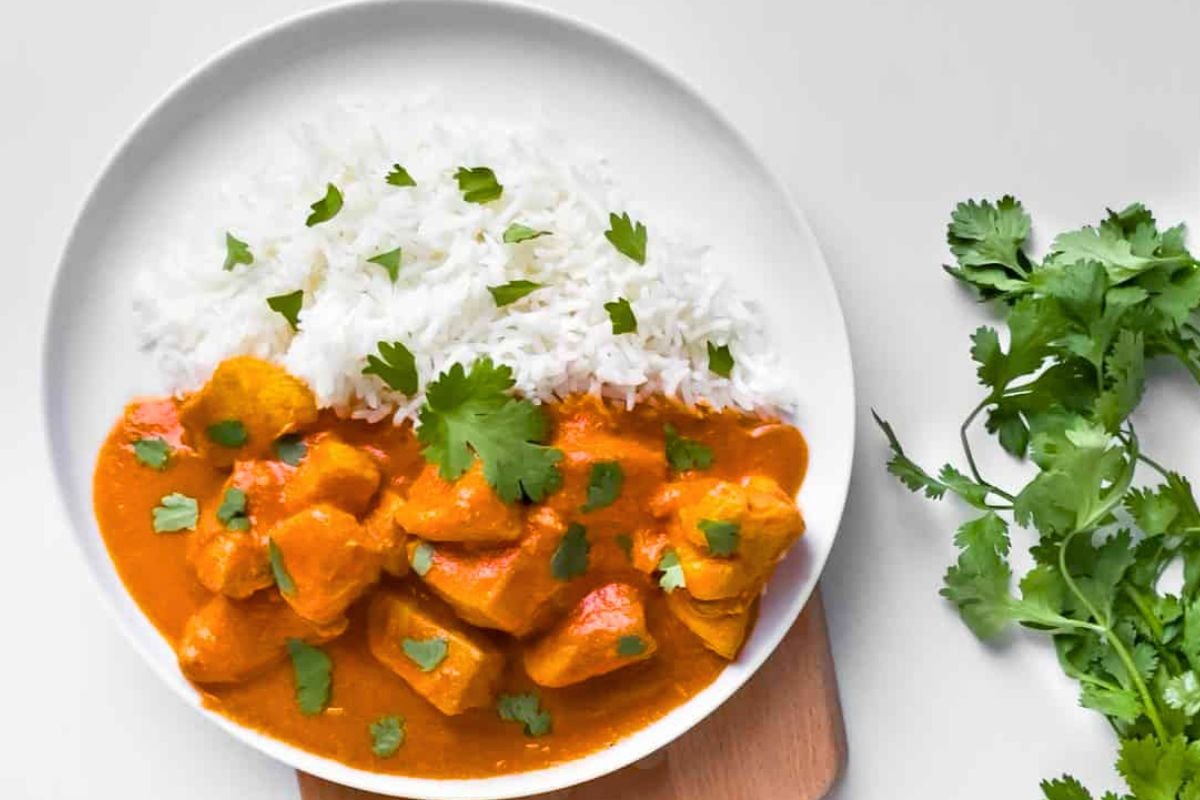 Dairy Free Butter Chicken garnished with cilantro.