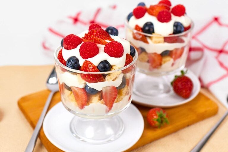 Greek Yogurt Berry Trifle on wooden board.