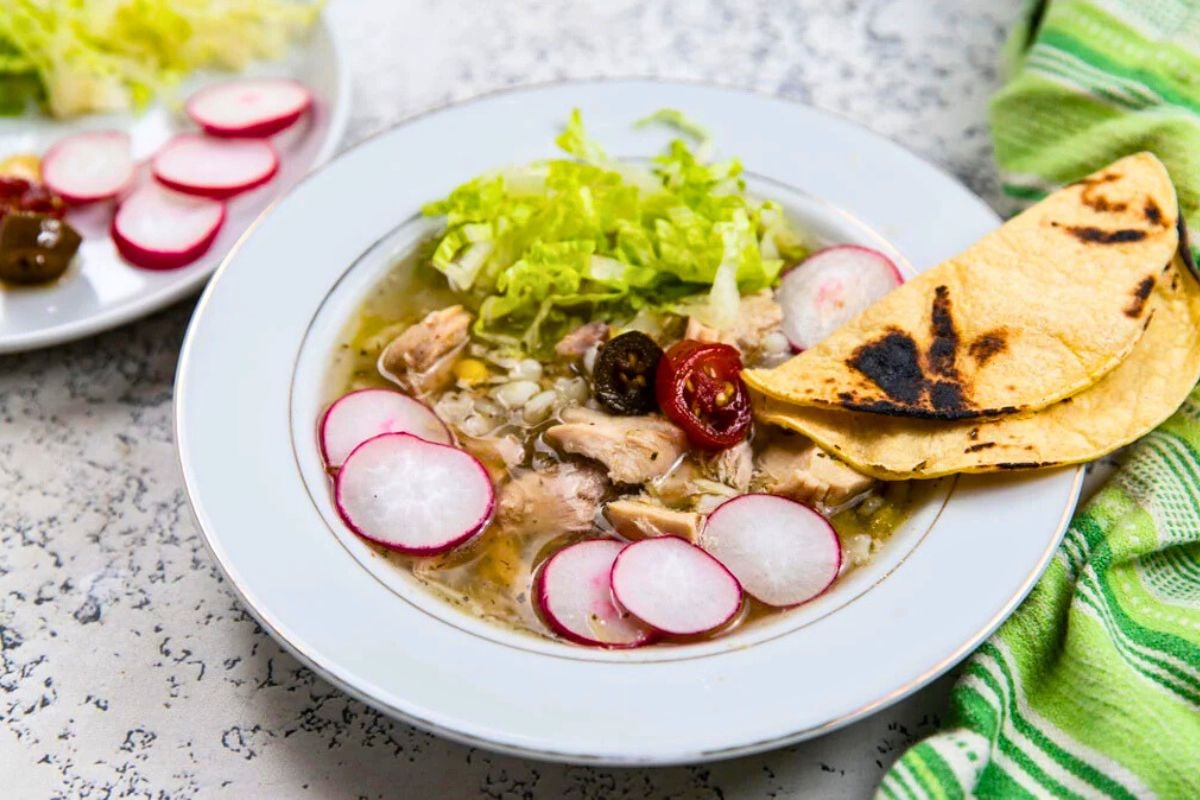 Green Chicken Pozole served in a bowl.