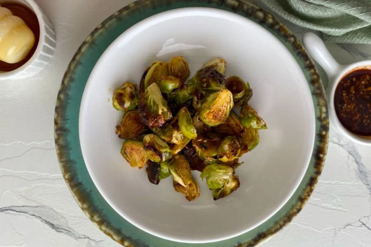 Honey Sriracha Brussels Sprouts served on a plate.