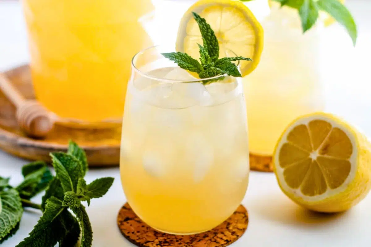 Iced Green Tea topped with mint leaves.