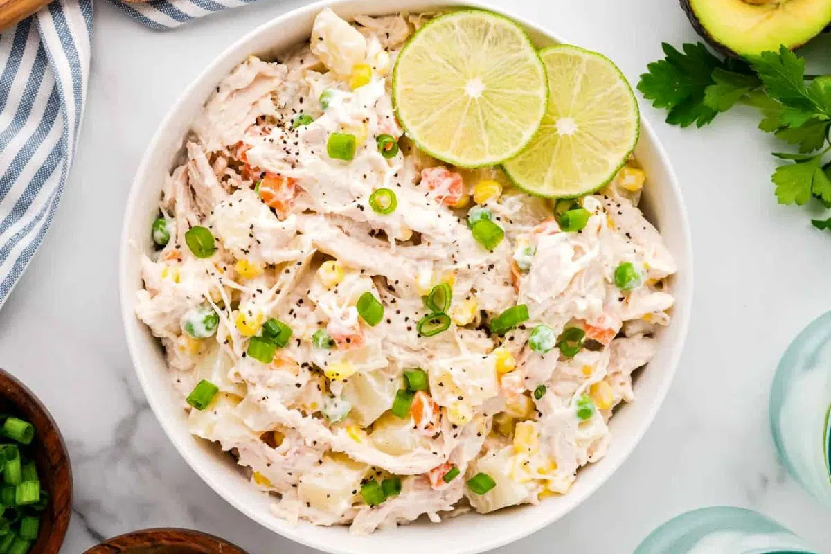 Mexican Chicken Salad garnished with chopped spring onions.