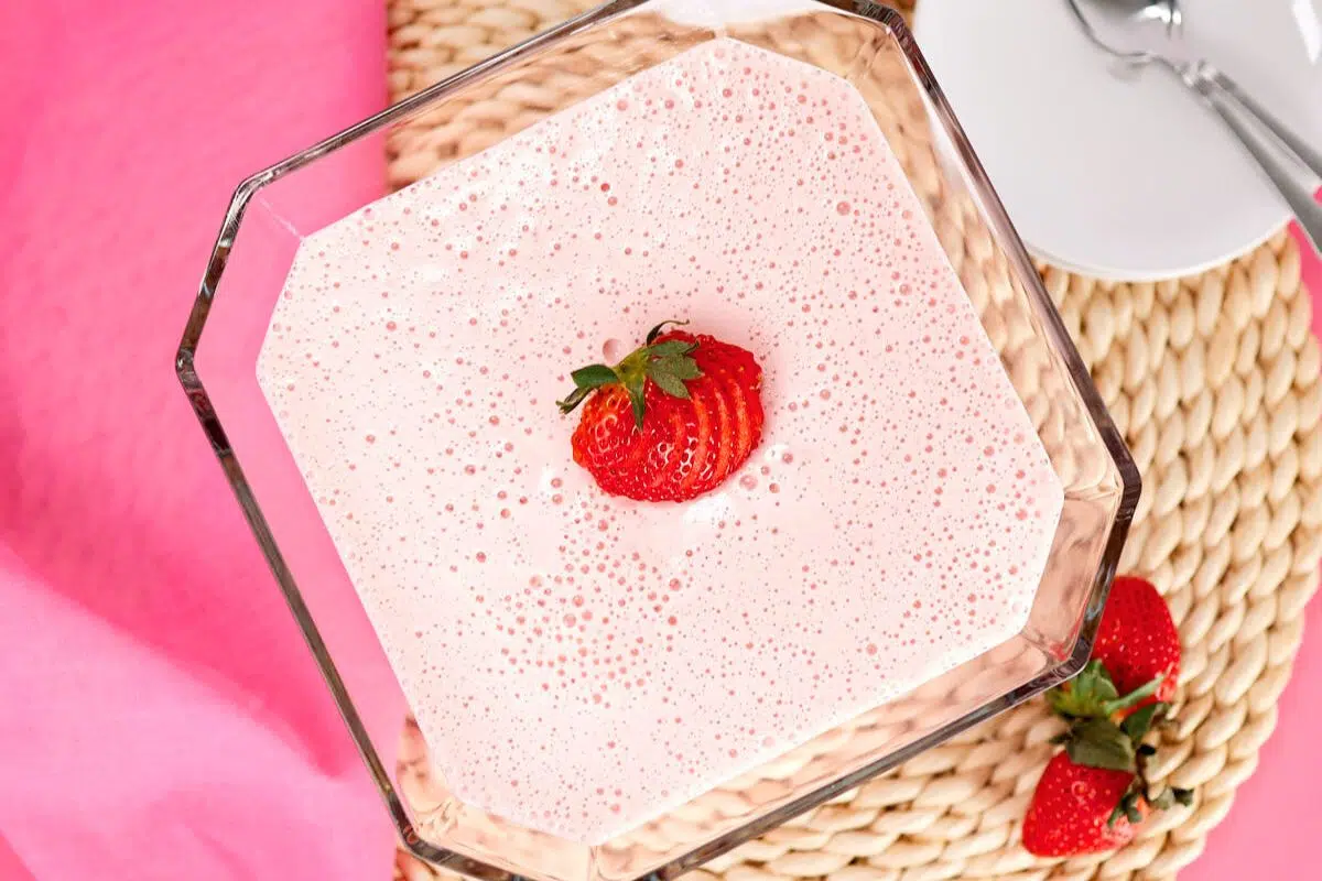 Mexican Milk Jello topped with strawberry.