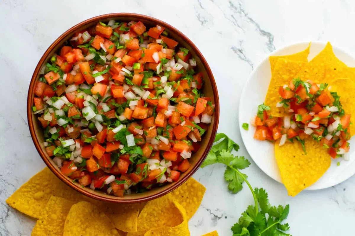 Pico de Gallo alongside chips.