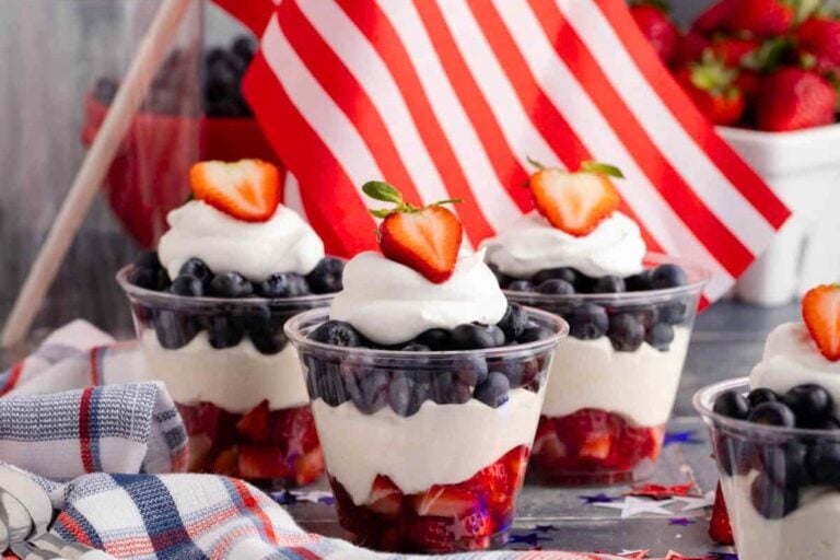 Red, White, and Blue Fruit Cups filled with berries.