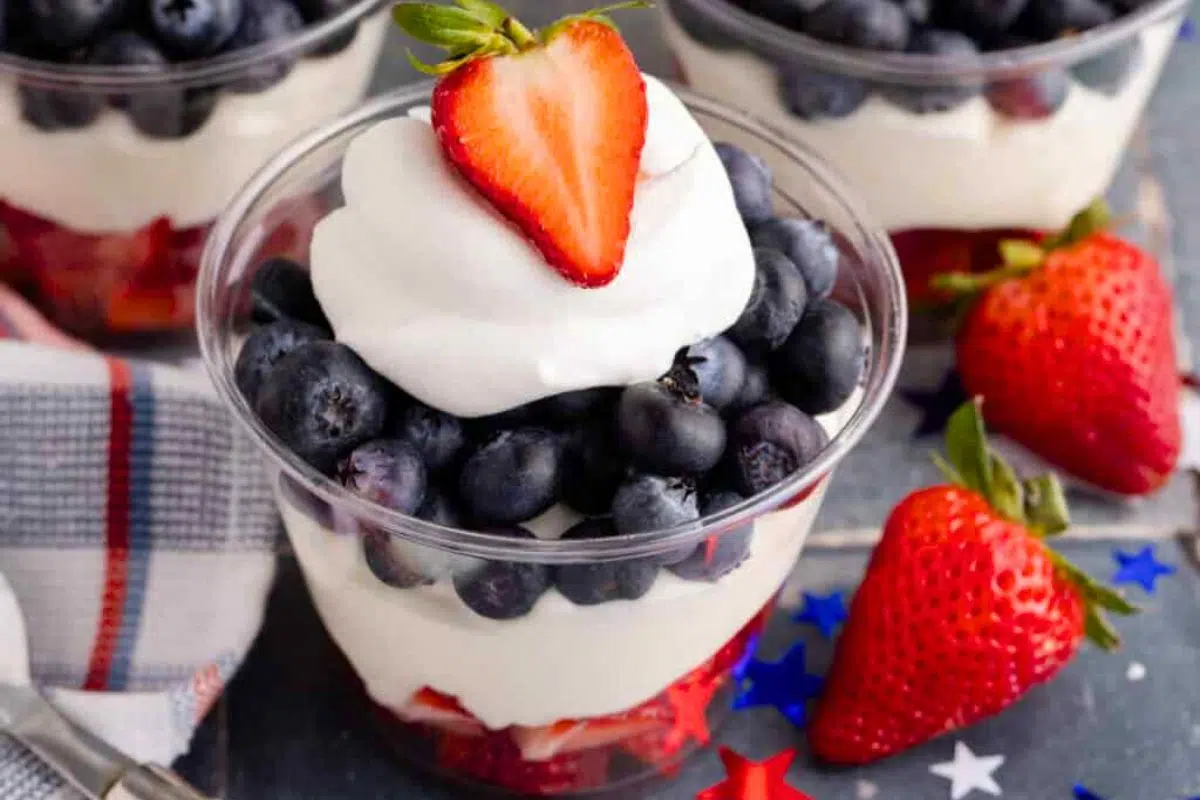 Red, White, and Blue Fruit Cups loaded with berries.