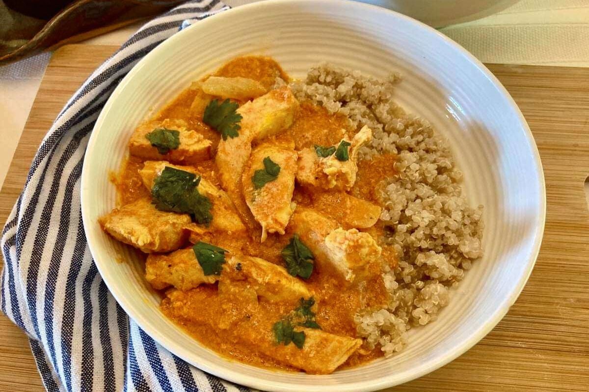 Slow Cooker Indian Chicken Curry garnished with chopped cilantro.