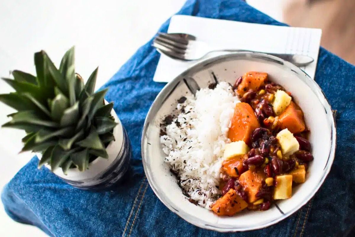 Spicy Sweet Potato Chili with Pineapple served with rice.
