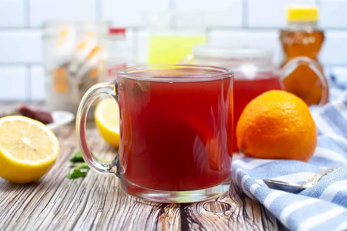 Starbucks Medicine Ball alongside lemon and orange.