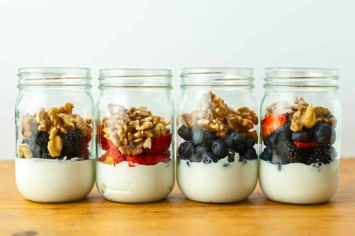 Berry Yogurt Parfait in jars.