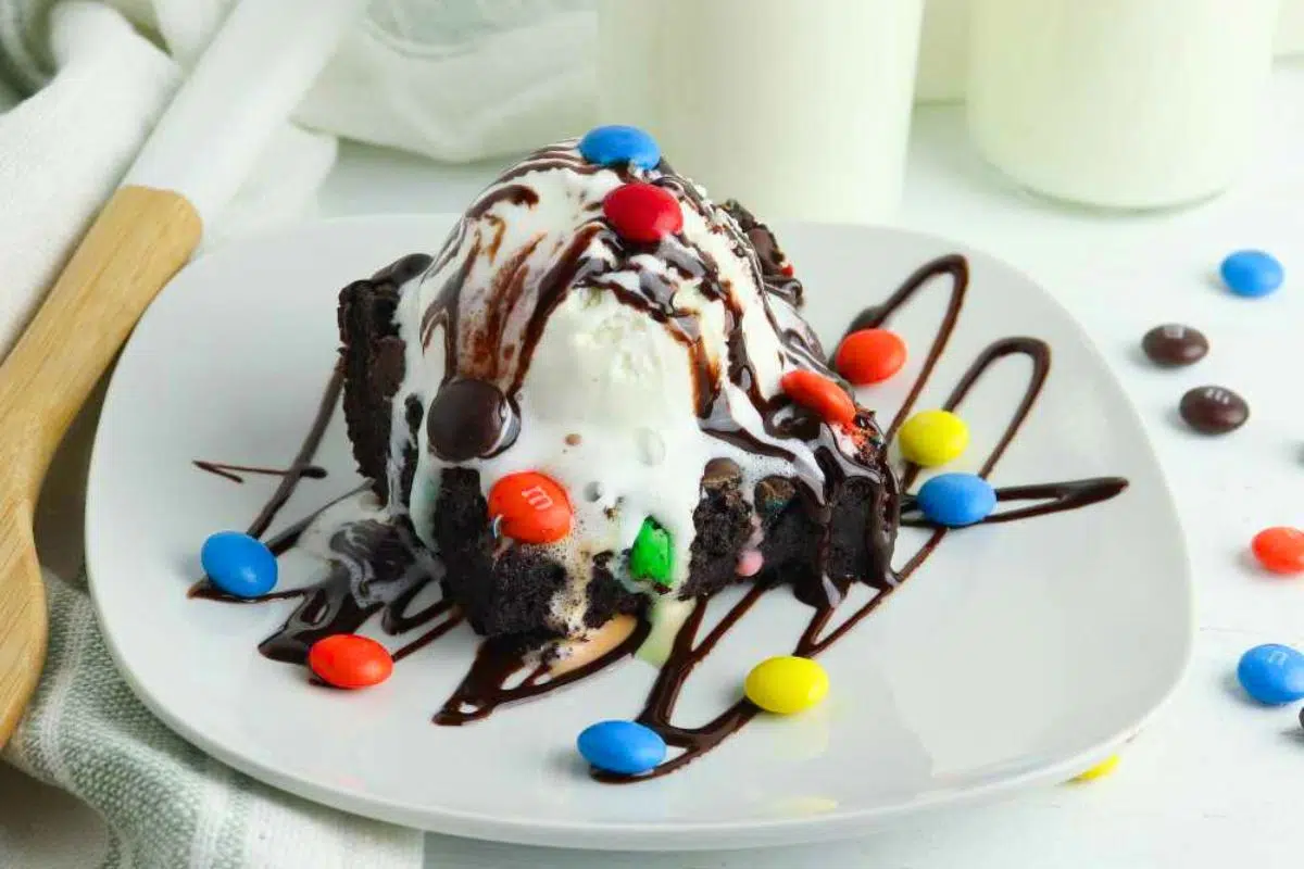 Chocolate Dump Cake topped with chocolate candies.