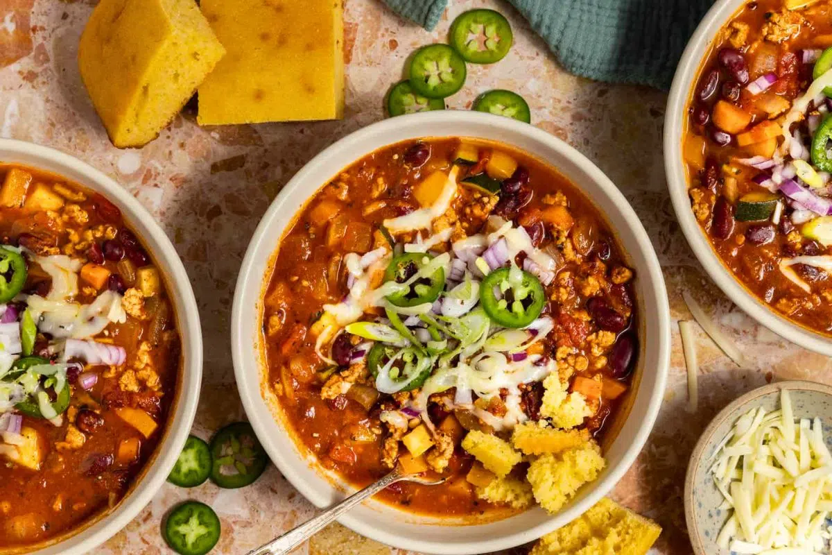 Dutch Oven Chili topped with green onions.