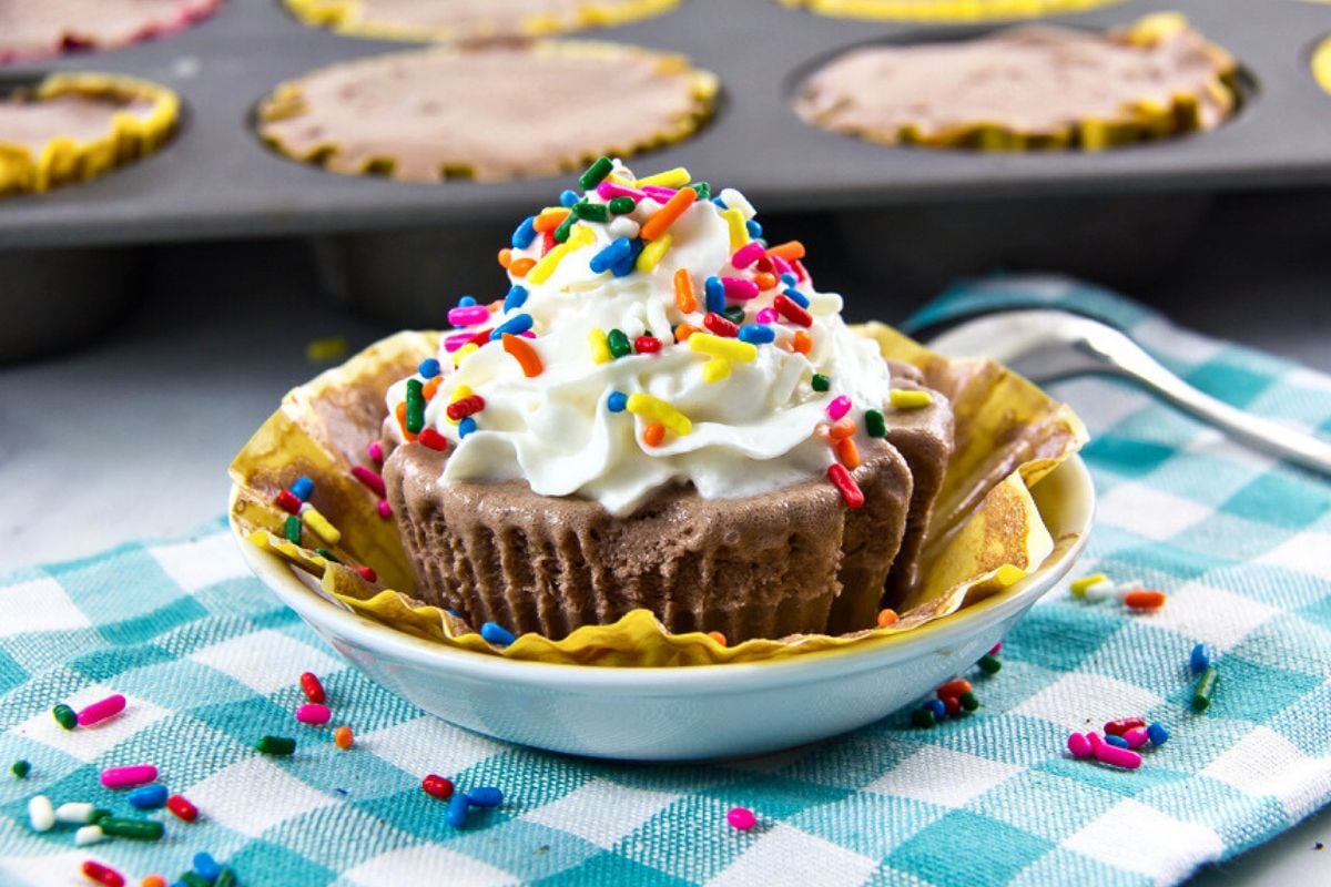 Ice Cream Cake Cupcakes topped with sprinkles.