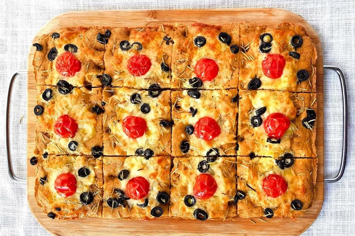 Italian Focaccia Keto Bread on a wooden tray.