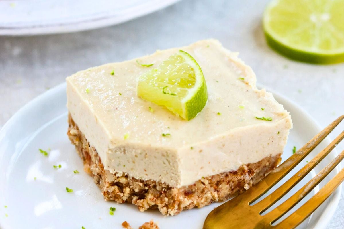 A slice of Key Lime Pie Bars served on a plate.