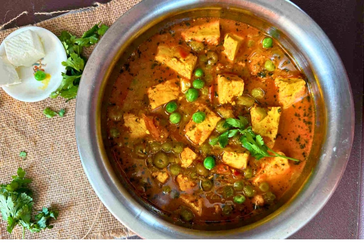 Matar Paneer in a cook ware. 